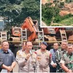 Barang bukti alat berat dan mesin dompeng dalam pengungkapan kasus tambang emas ilegal di Kabupaten Way Kanan, Lampung, yang berujung vonis terhadap para terdakwa.